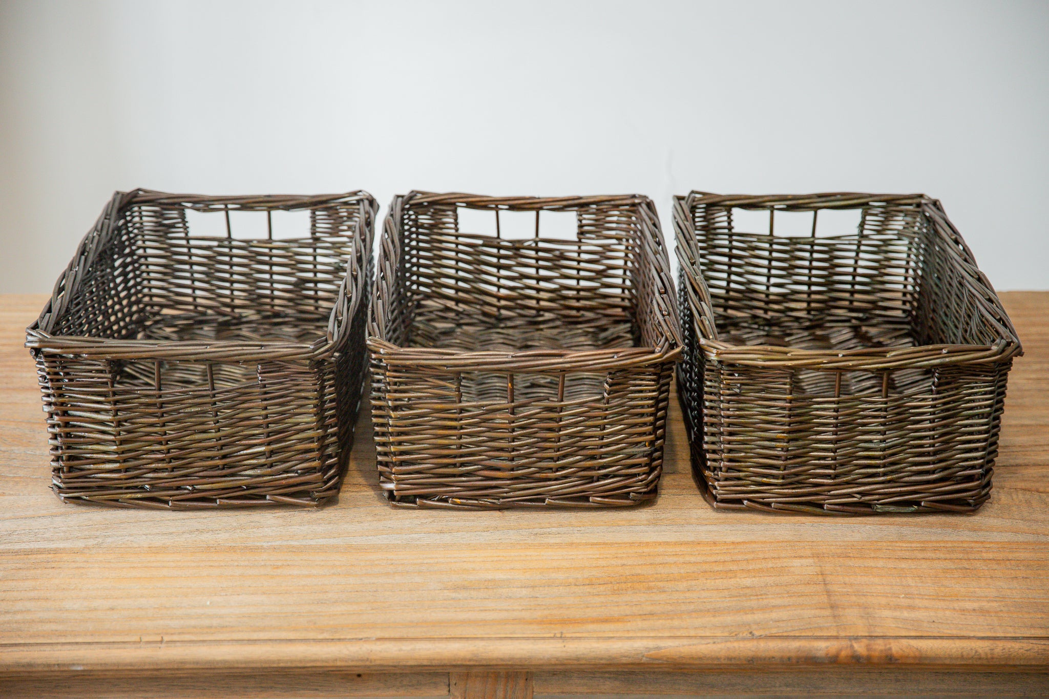 H&K set of willow wicker storage baskets in dark forest green