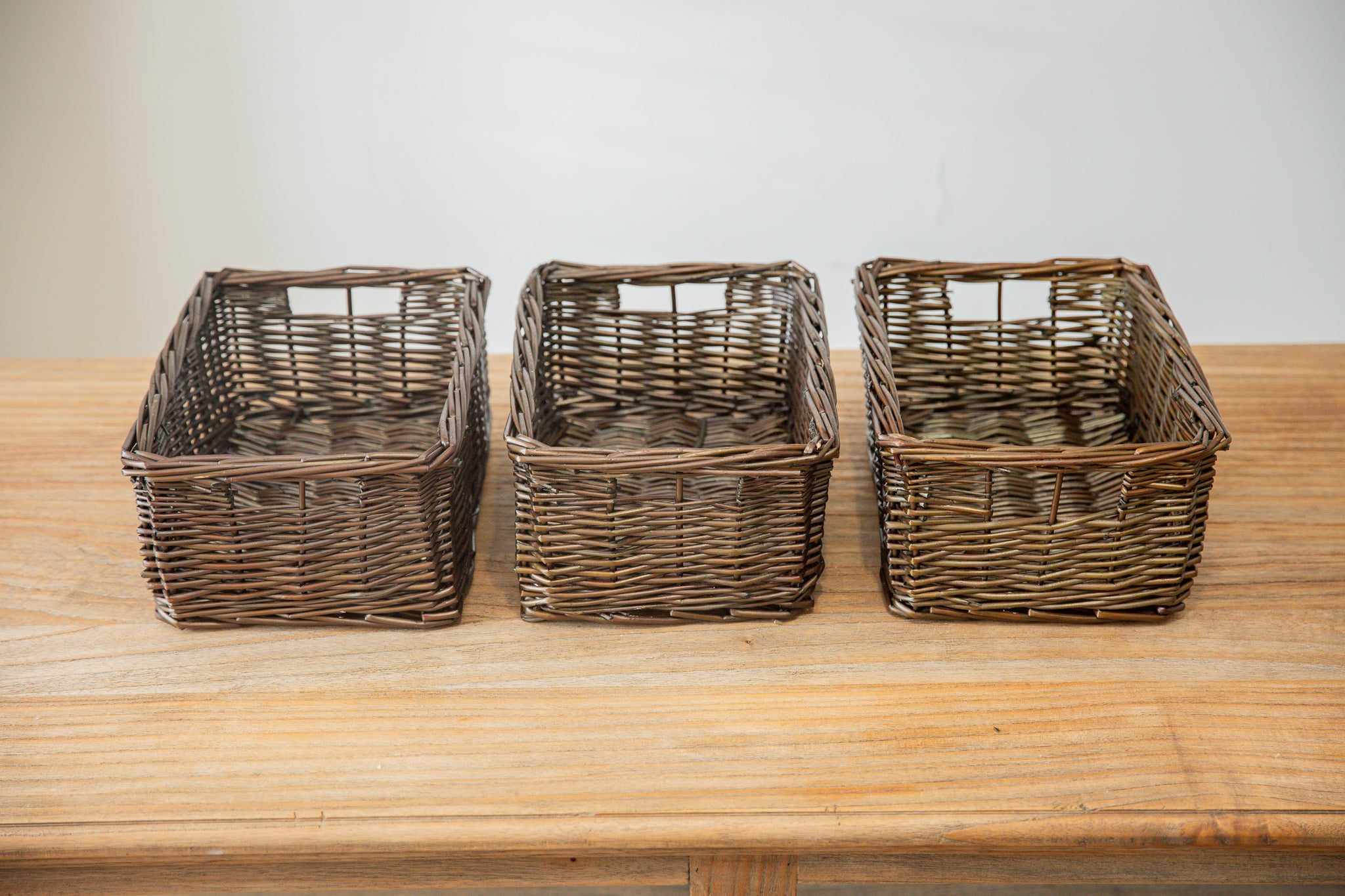 H&K set of willow wicker storage baskets in dark forest green